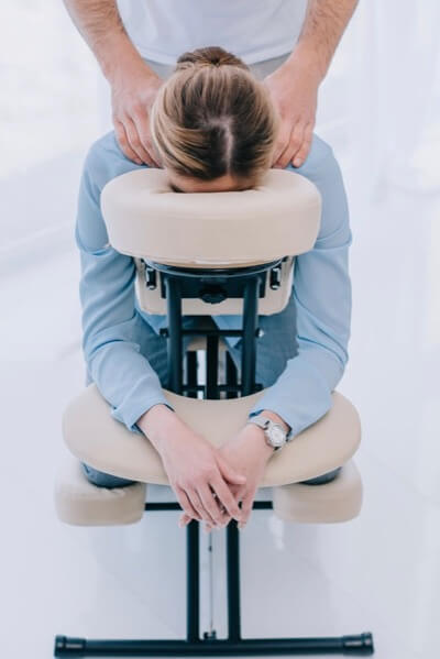 Woman Receiving Chair Massage