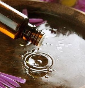 Essential Oil Dropping Into Water | Essential Oil Safety Guidelines