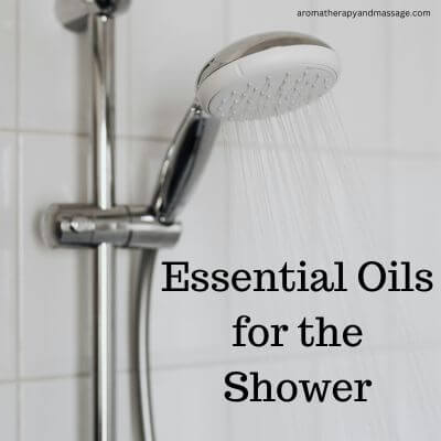 Water flowing from shower head with the words Essential Oils for the Shower