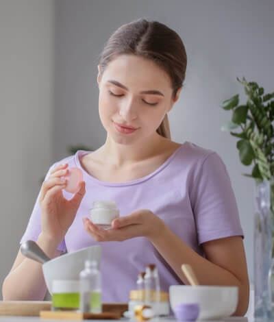 Woman blending essential oils