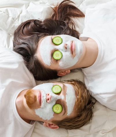 A couple getting face masks for acne.