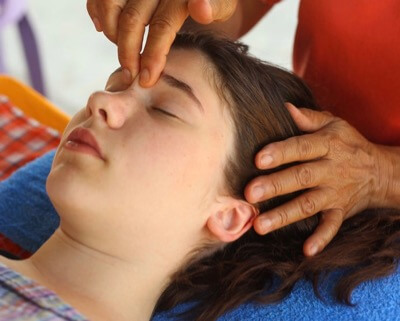 Jin Shin Do on a woman's face.