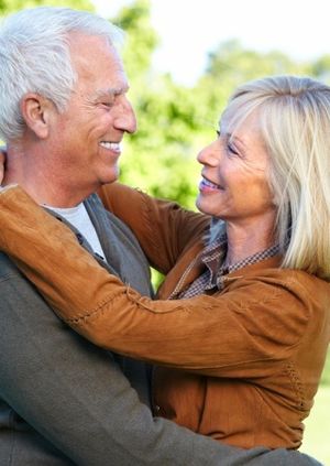 Woman and man looking lovingly at each other.