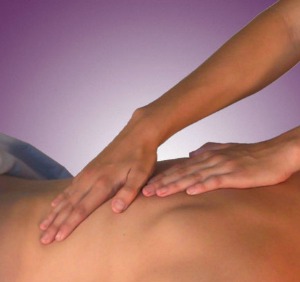 Person receiving back massage.