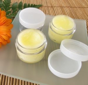 Containers of DIY Lip Balm Using Essential Oils